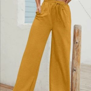 Drawstring awaits Wide Leg Sweatpants